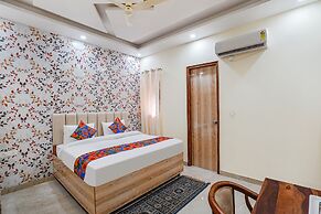 Fabhotel Ada Residency