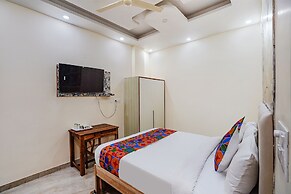 Fabhotel Ada Residency