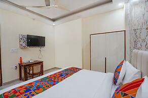 Fabhotel Ada Residency