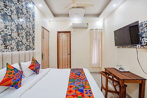 Fabhotel Ada Residency