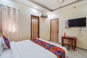 Fabhotel Ada Residency