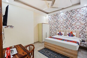 Fabhotel Ada Residency