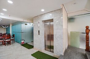 Fabhotel Ada Residency