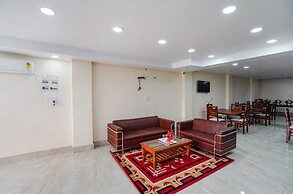 Fabhotel Ada Residency