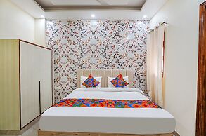 Fabhotel Ada Residency