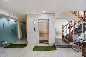 Fabhotel Ada Residency