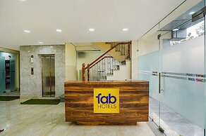 Fabhotel Ada Residency