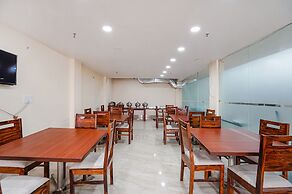 Fabhotel Ada Residency