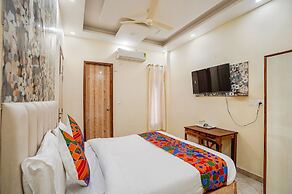 Fabhotel Ada Residency