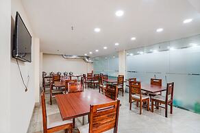 Fabhotel Ada Residency