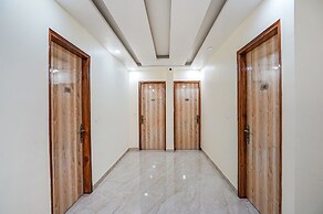 Fabhotel Ada Residency