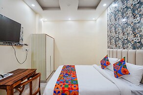 Fabhotel Ada Residency