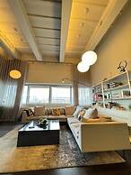 Industrial-chic 1BD Loft by the River Fulham!