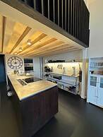 Industrial-chic 1BD Loft by the River Fulham!