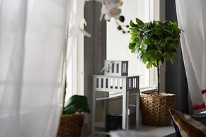 Pastel Blue Studio in Lodz by Renters