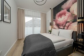 Kępa Mieszczańska Apartament by Renters