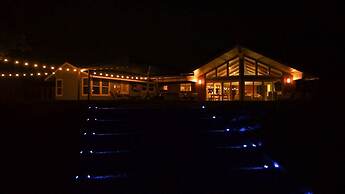 Whispering Breezes At Windy Hill 4 Bedroom Home by RedAwning