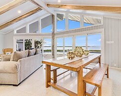 Whispering Breezes At Windy Hill 4 Bedroom Home by RedAwning