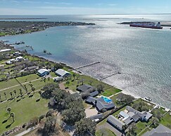 Whispering Breezes At Windy Hill 4 Bedroom Home by RedAwning