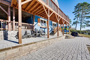 Lakefront New London Retreat w/ Dock & Hot Tub!