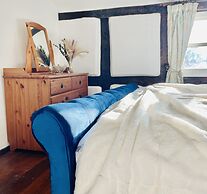 Log Burner and Beamed Ceilings-king Size Bed