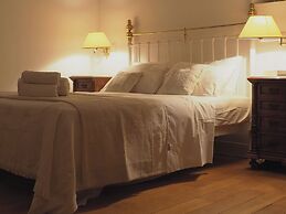 The Palm Rock Finikia Santorini