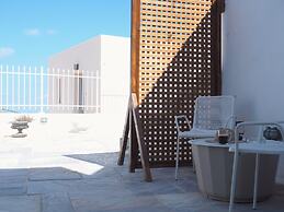 The Palm Rock Finikia Santorini