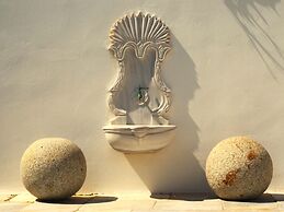 The Palm Rock Finikia Santorini