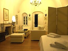 The Palm Rock Finikia Santorini