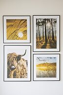 Grey Apartment Śródmieście by Renters