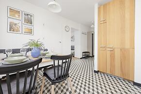Grey Apartment Śródmieście by Renters
