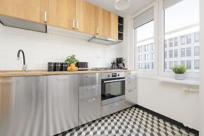Grey Apartment Śródmieście by Renters
