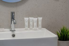 Minimalist Studios in Poznań by Renters