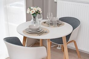 Minimalist Studios in Poznań by Renters