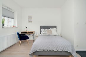 Minimalist Studios in Poznań by Renters