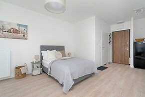 Minimalist Studios in Poznań by Renters