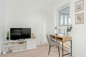 Minimalist Studios in Poznań by Renters