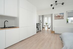 Minimalist Studios in Poznań by Renters