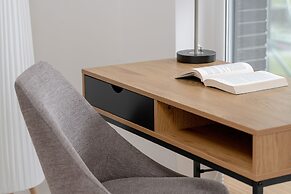 Minimalist Studios in Poznań by Renters