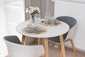 Minimalist Studios in Poznań by Renters