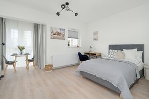 Minimalist Studios in Poznań by Renters