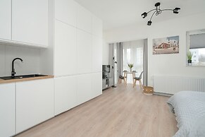 Minimalist Studios in Poznań by Renters