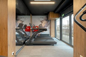 Minimalist Studios in Poznań by Renters