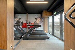 Minimalist Studios in Poznań by Renters