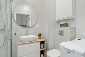 Minimalist Studios in Poznań by Renters