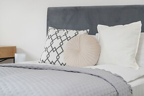 Minimalist Studios in Poznań by Renters