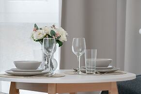 Minimalist Studios in Poznań by Renters