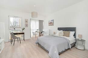 Minimalist Studios in Poznań by Renters
