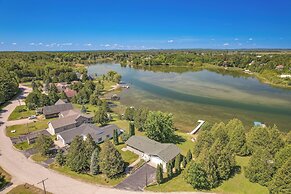 Riverfront Cheboygan Home w/ Deck & Boat Dock!