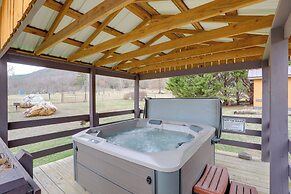 River Access & Hot Tub: Cozy Hot Springs Cabin